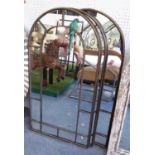 GARDEN MIRRORS, a set of three, with domed tops, in a metal frame, 106cm x 55cm.