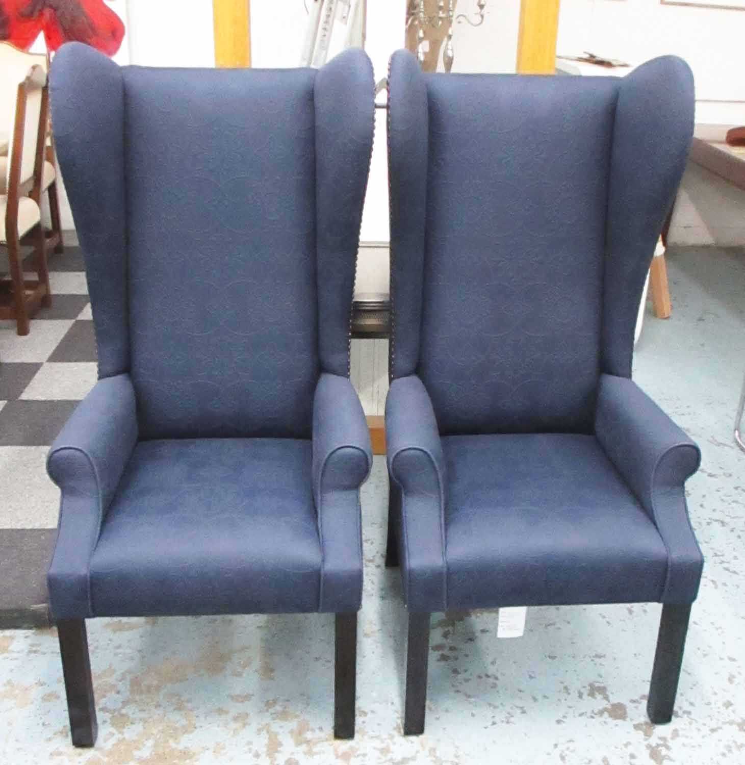 GEORGE SMITH WING ARMCHAIRS, a pair, each with blue patterned upholstery and studded decoration,