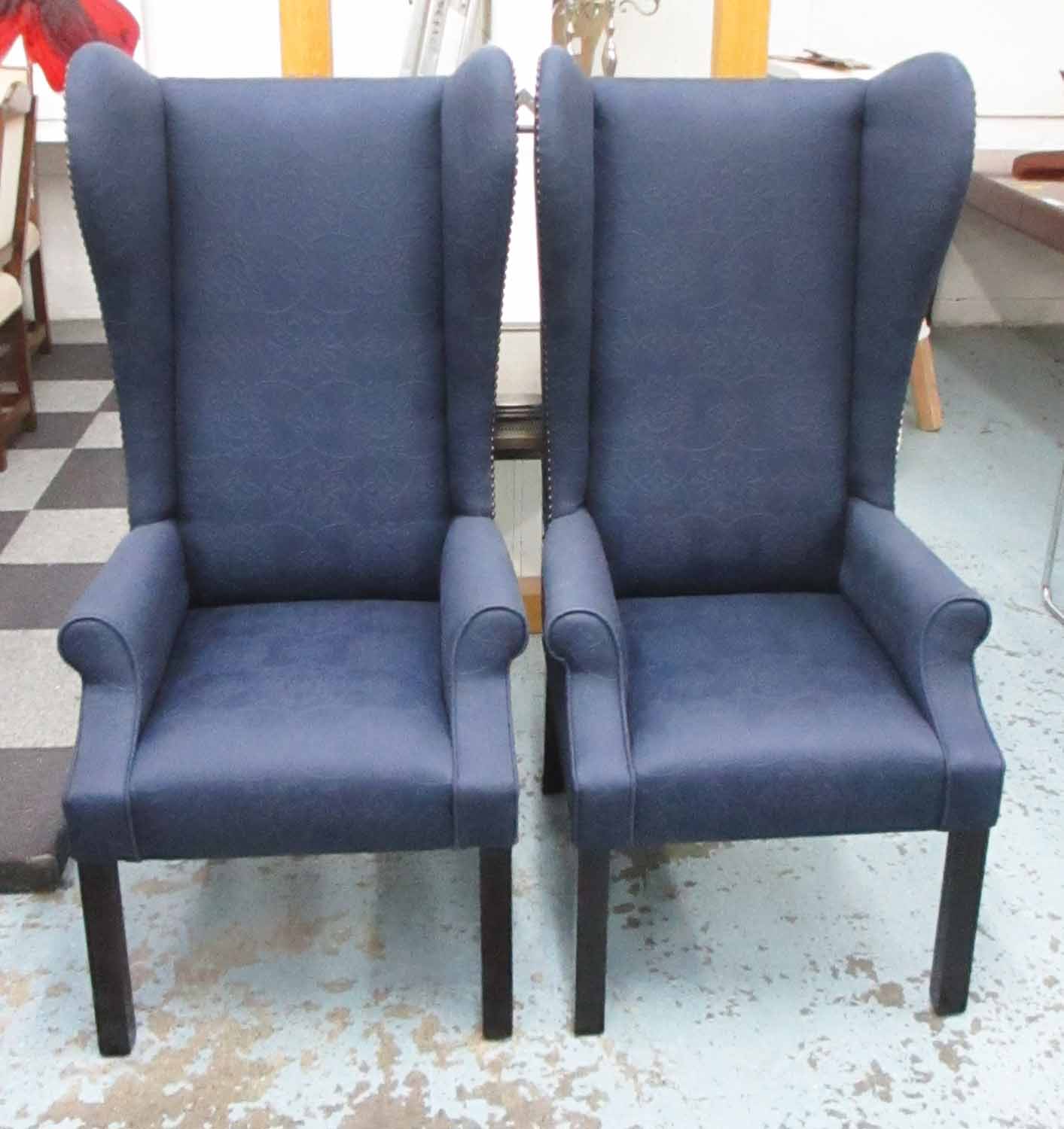 GEORGE SMITH WING ARMCHAIRS, a pair, each with blue patterned upholstery and studded decoration,