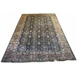 ANTIQUE TABRIZ CARPET, 335cm x 219cm, all over palmettes, flowerhead and stylised vine design,