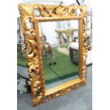 HARRISON & GIL MIRROR, by Christopher Guy, gilt carved frame, 100cm x 128cm.