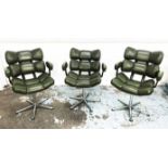 SWIVEL LOUNGE CHAIRS, a set of three, circa 1970's,