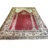 ANTIQUE TABRIZ HAJI JALILY CARPET, 360cm x 248cm, mihrab field within complimentary floral borders.