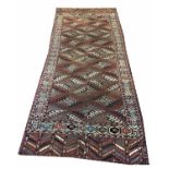 ANTIQUE YOMUT TURKMEN RUG, 280cm x 120cm, Dyrnak gul design field with curl leaf borders.