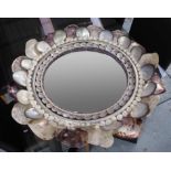 SHELL MIRROR, 80cm diam overall.