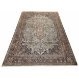 KASHMIR SILK RUG, 243cm x 160cm, central medallion on an ivory palmette and vine field,