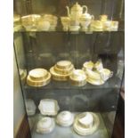 WEDGWOOD 'GOLD FLORENTINE' DINNER SERVICE, nine plate setting including tea and coffee wares,