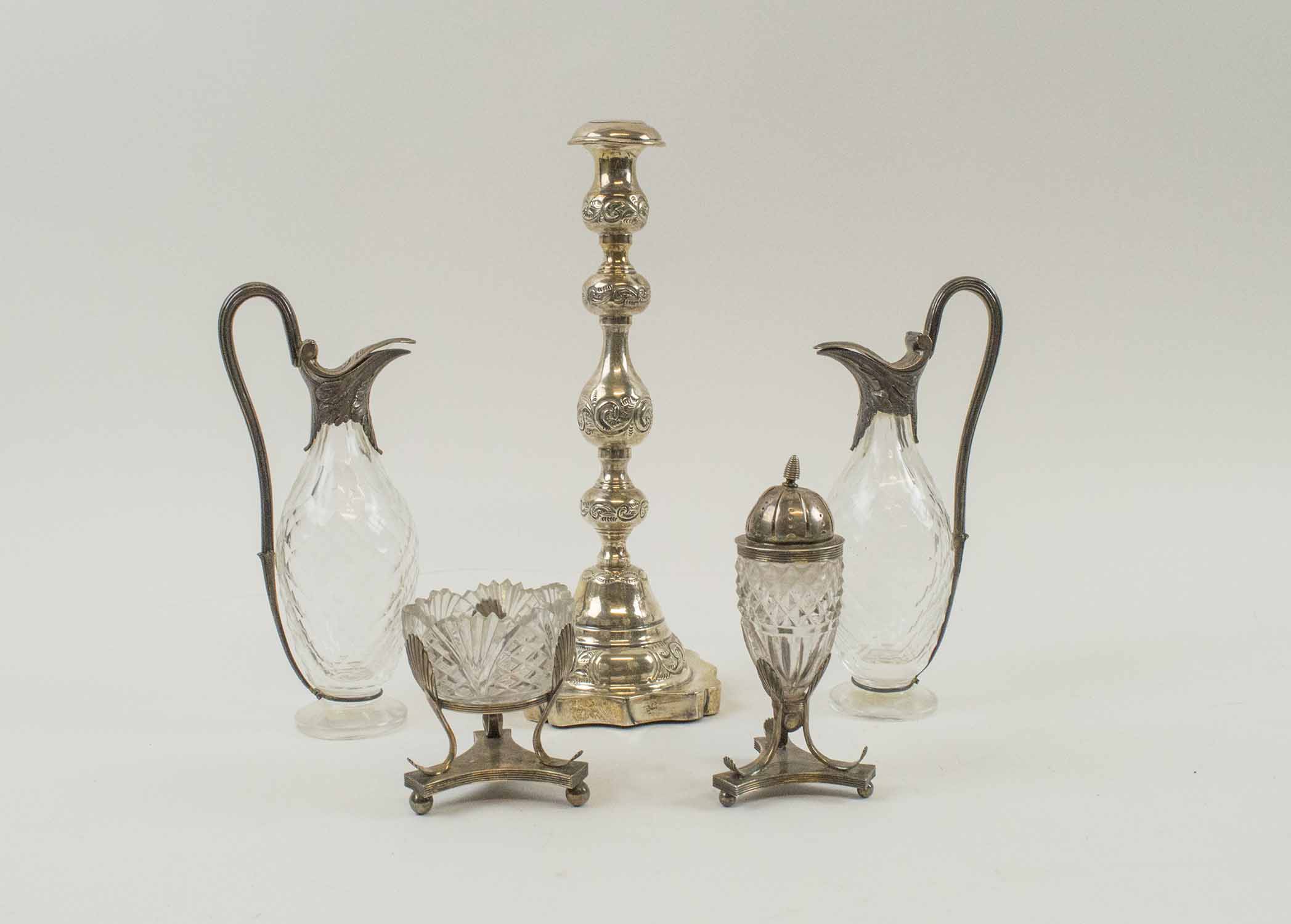 TWO FRENCH SILVER AND CUT GLASS CRUET ITEMS, plus a silver candlestick,