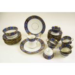 PRINCE ALBERT CROWN CHINA PART TEA SERVICE, blue and gilt band decoration.