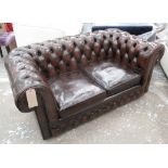 CHESTERFIELD SOFA, two seater, buttoned dark tanned leather, on castors, 161cm L.