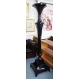 PILLAR CANDLE STICK, of substantial proportions, floor standing, ebonised finish, 200cm tall.