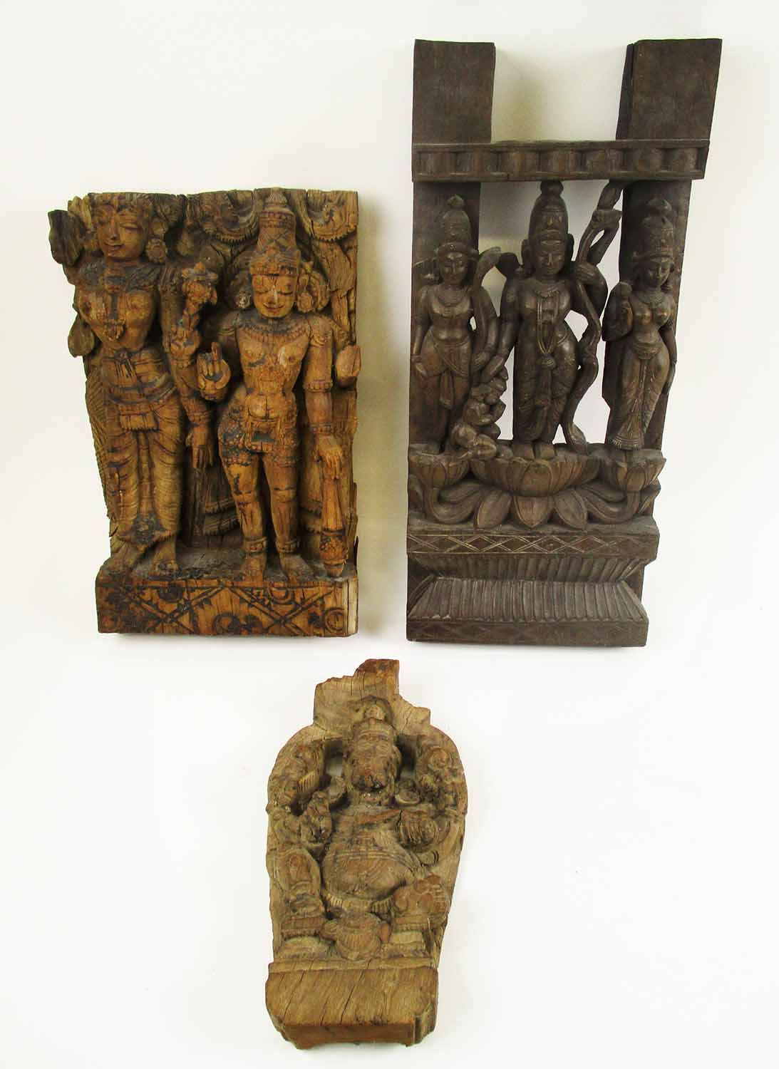 THREE INDIAN WOOD CARVINGS, 19th century and later, Mysore, variously depicting Ganesh,