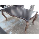 DINING TABLE, Louis XV style hardwood with shaped ebonised top on detachable cabriole legs,