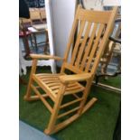 ROCKING CHAIR, oak attributed to Benchmark, 115cm H x 66cm.