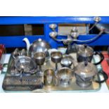 TRAY CONTAINING EPNS WARE, SERVING SPOONS, DECO TEA POT, GOBLETS, CANDELABRA ETC