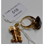 9 CARAT GOLD DRESS STONE RING, TOGETHER WITH A NOVELTY 9 CARAT GOLD STEAM ENGINE PENDANT -