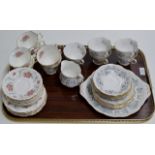 TRAY CONTAINING 2 PART ROYAL ALBERT TEA SETS