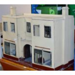 LARGE DOLLS HOUSE WITH VARIOUS FURNITURE THERE IN