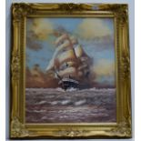 23½" X 19½" GILT FRAMED OIL PAINTING ON CANVAS - A GALLEON ON A CHOPPY SEA