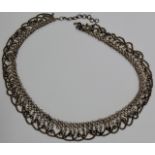 A VINTAGE EASTERN WHITE METAL BELLY DANCER'S BELT