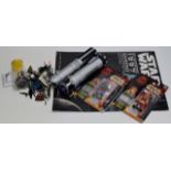 STAR WARS INTEREST - LOT COMPRISING 2 TOY LIGHT SABRES, VARIOUS ACTION FIGURE WEAPONS & PARTS, 2