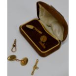 A LOT OF 9 CARAT GOLD COMPRISING A PAIR OF CUFFLINKS, AN ODD CUFFLINK, A POCKET WATCH CLASP &