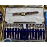 CASED SET OF 12 SHEFFIELD SILVER TEASPOONS WITH TONGS & OLD SILVER CASED WRIST WATCH ON LEATHER