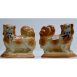 A PAIR OF VICTORIAN POTTERY WALLY DOGS