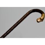 A 37" GENTLEMAN'S WALKING CANE WITH GOLD MOUNTED HANDLE - RUSSIAN HALLMARKS MARKS, STAMPED "56"