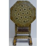 AN EASTERN IRANIAN MOTHER OF PEARL INLAID FOLDING FIRE SCREEN TABLE - APPROXIMATE DIMENSIONS, STANDS