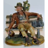 CAPODIMONTE ORNAMENT MAN ON A BENCH