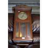 MAHOGANY CASED STRIKING WALL CLOCK