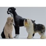 A LARGE NORTH LIGHT DOG ORNAMENT, TOGETHER WITH A BORDER FINE ARTS OLD ENGLISH SHEEP DOG