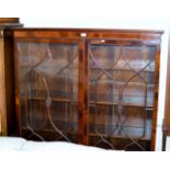 MAHOGANY DOUBLE DOOR BOOKCASE ON BRACKET FEET