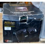 A NIKON COOLPIX CAMERA IN BOX