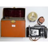 AN OLD & LARGE POLAROID CAMERA WITH SOME ACCESSORIES & LEATHER BOUND CARRY CASE