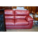 RED LEATHER 2 SEATER SETTEE