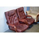 PAIR OF WOODEN FRAMED LEATHER EASY CHAIRS