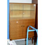 TEAK GLASS FRONTED BOOKCASE WITH PRESS BENEATH