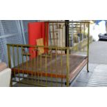 AN ARTS & CRAFTS BRASS DOUBLE BED FRAME