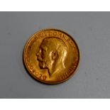 A FULL SOVEREIGN COIN DATED 1912