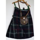 A VINTAGE GENTS KILT WITH A LEATHER SPORRAN