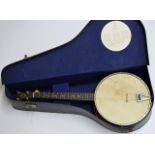 AN OLD DULCETTA BANJO BY JOHN GREY & SONS OF LONDON WITH FITTED CASE