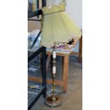 A VINTAGE ONYX GILT FINISHED FLOOR LAMP WITH SHADE