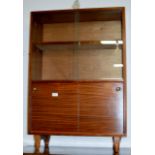 A VINTAGE TEAK GLASS FRONTED BOOKCASE