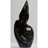 A 16" UNUSUAL HEAVY CARVED STONE FIGURAL DISPLAY