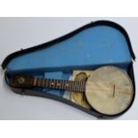 AN OLD "KEECH" BANJO WITH FITTED CASE