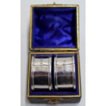 A PAIR OF STERLING SILVER NAPKIN RINGS WITH BIRMINGHAM ASSAY MARKS, MAKER MARKS FOR J SHERWOOD &