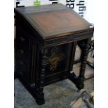 A 21½" VICTORIAN EBONISED DAVENPORT DESK WITH LEATHER WRITING SLOPE