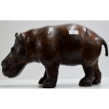 A NOVELTY OLD LEATHER BOUND HIPPO DISPLAY